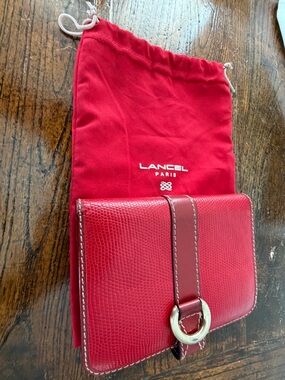 Lancel red embossed leather compact wallet